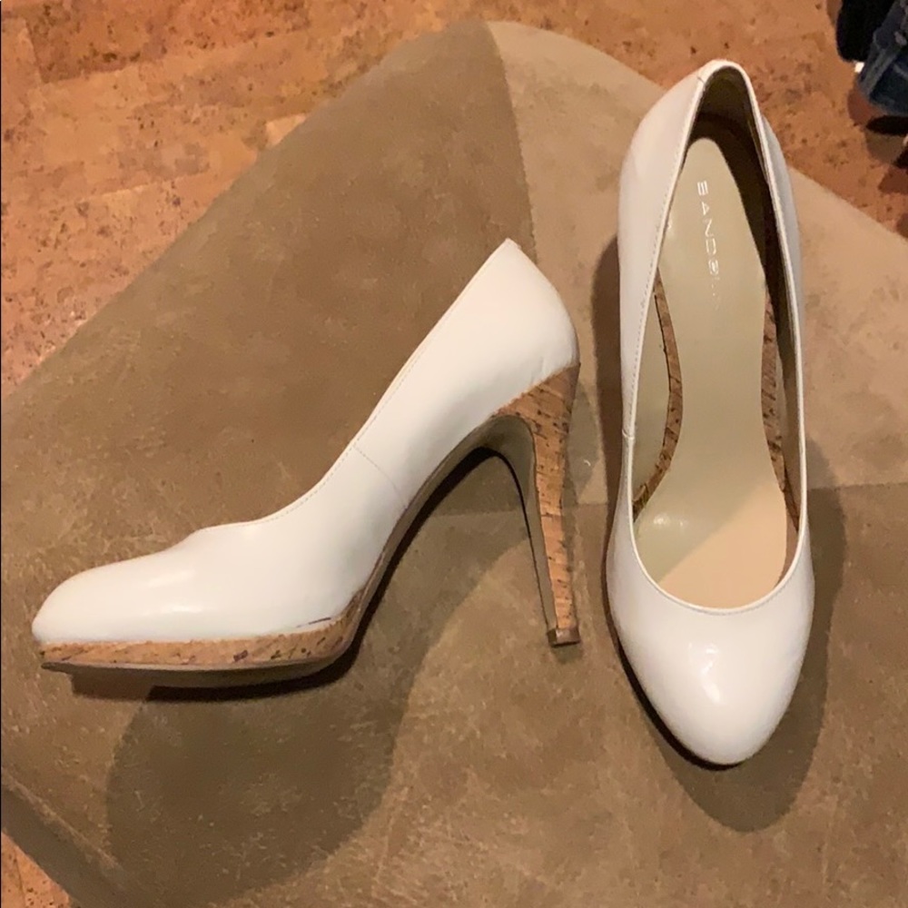 Bandolino patent pumps with cork heel & platform.